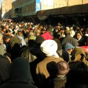 A street so crowded with shoppers that there is literally no room to walk