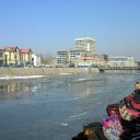 Thin ice forms on the Kabul River, as it meanders through the city\'s center