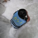 Woman-in-Wadi-Mujib-sitting-in-waterfall