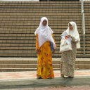 Sights like this of two muslim Malay women in their traditional head scarves, are common of women all over Malaysia