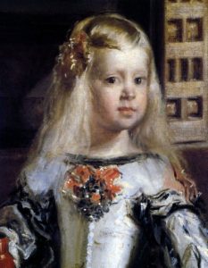 Fragment of Infanta Margarita, a young girl with blonde hair adorned with ribbons, wearing an ornate silver-gray dress with a wide skirt, depicted in Diego Velázquez's painting Las Meninas (1656–57), oil on canvas, Museo del Prado, Madrid.